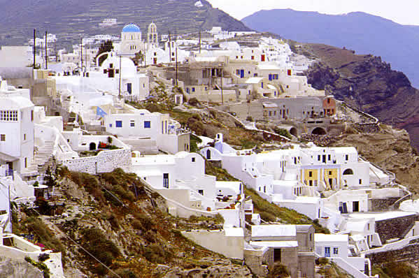 houses cling to the cliff slopes